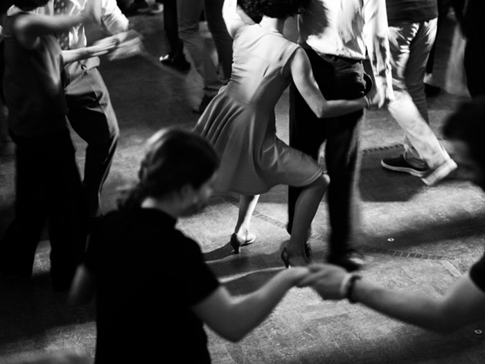 vintage looking photo of people swing dancing